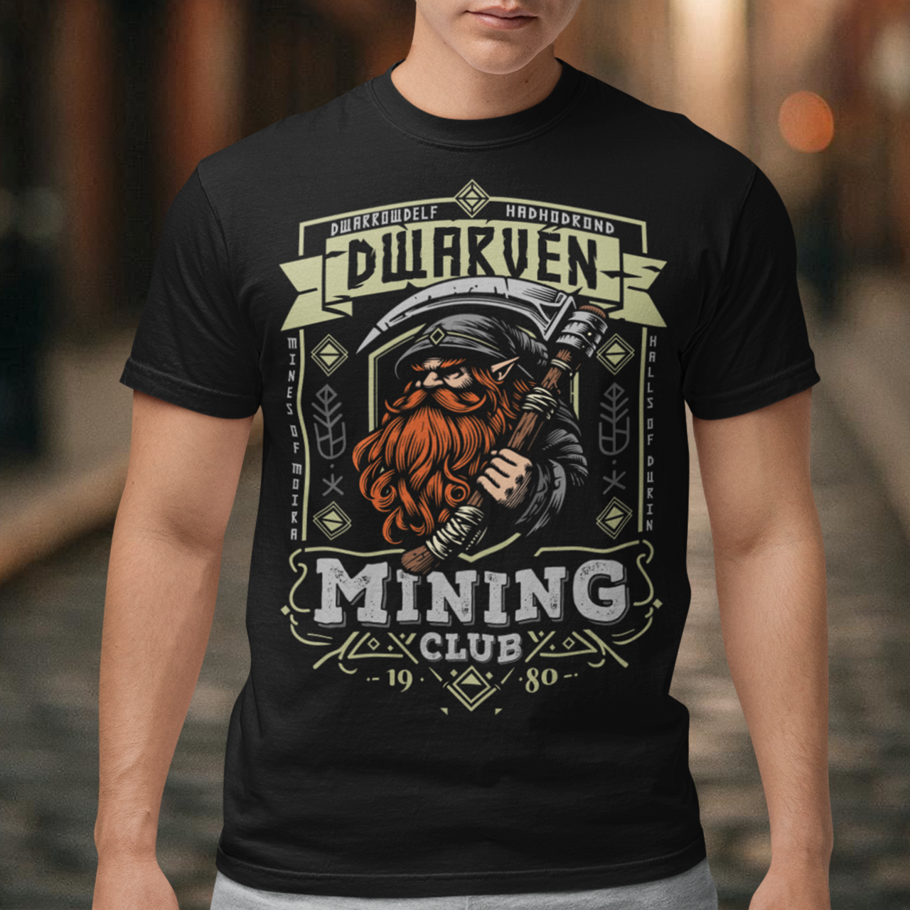 Join the ranks of the underground elite with our Dwarven Mining Club t-shirt! Featuring a bold illustration of a rugged dwarf — pickaxe in hand, beard thick with grit, and a steely glint in his eye — this design is perfect for fans of fantasy, adventure, and all things dwarven. The distressed DWARVEN MINING CLUB text gives it a vintage, hard-worn look, like it’s seen years of digging deep into the earth.