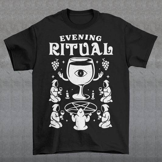 Black t-shirt featuring a white occult-style graphic with the text “Evening Ritual.” Design shows hooded figures gathered around a pentagram performing a ritual with wine glasses, candles, grapes, and a large mystical wine goblet with an eye symbol. Spooky gothic and illuminati-inspired humor combined with wine lover aesthetics.