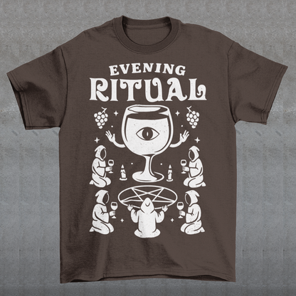 Brown t-shirt featuring a white occult-style graphic with the text “Evening Ritual.” Design shows hooded figures gathered around a pentagram performing a ritual with wine glasses, candles, grapes, and a large mystical wine goblet with an eye symbol. Spooky gothic and illuminati-inspired humor combined with wine lover aesthetics.