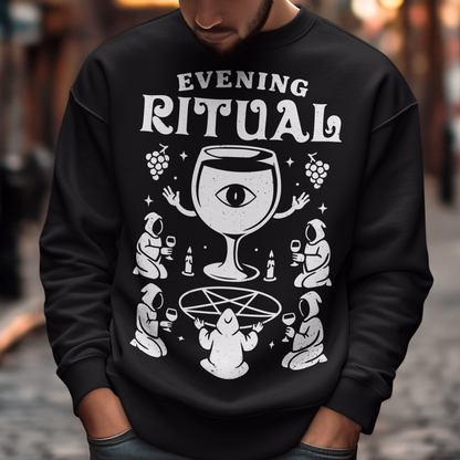 Black sweatshirt featuring a white occult-style graphic with the text “Evening Ritual.” Design shows hooded figures gathered around a pentagram performing a ritual with wine glasses, candles, grapes, and a large mystical wine goblet with an eye symbol. Spooky gothic and illuminati-inspired humor combined with wine lover aesthetics.