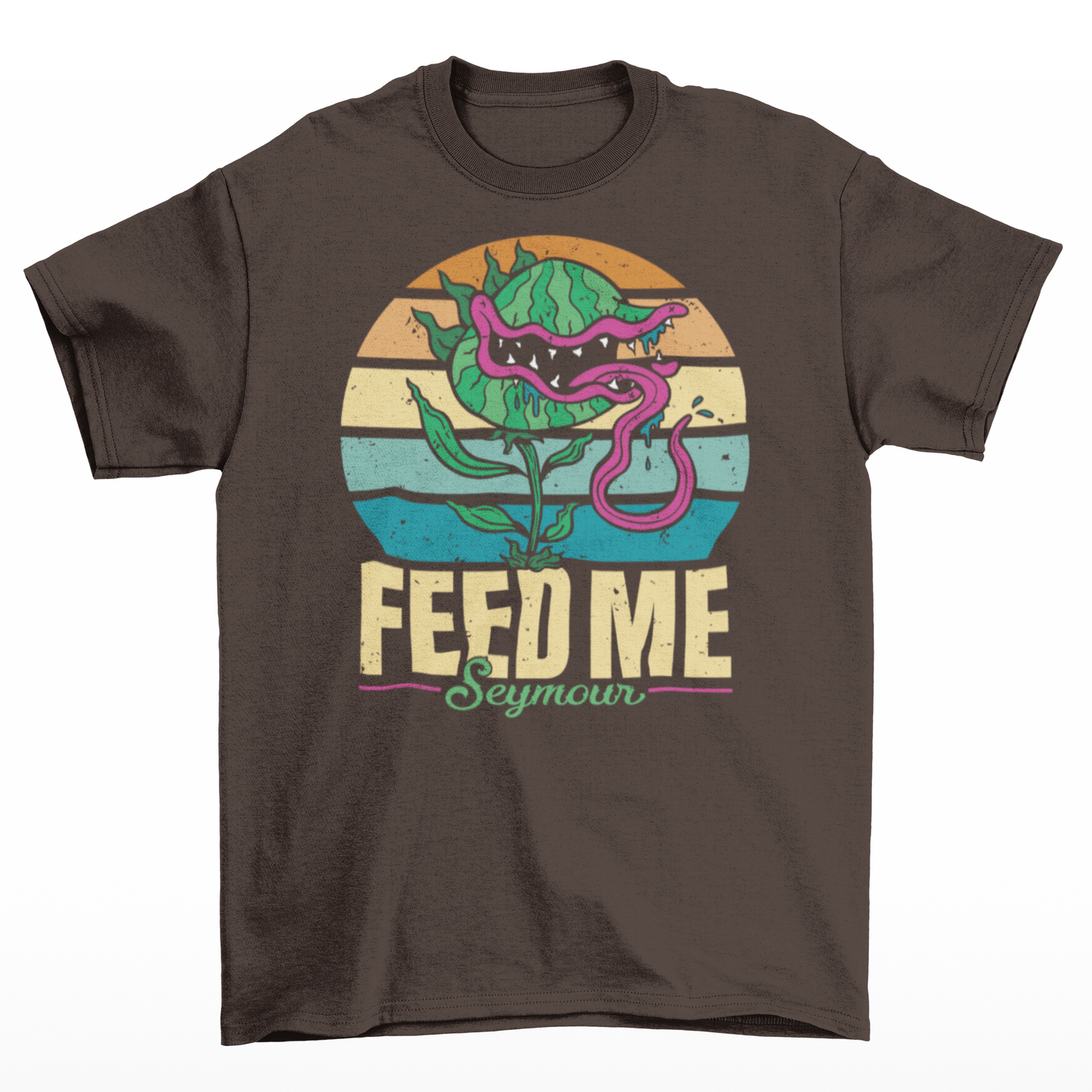 Brown t-shirt of sentient carnivorous plant with a retro sun background with text underneath "FEED ME SEYMOUR".