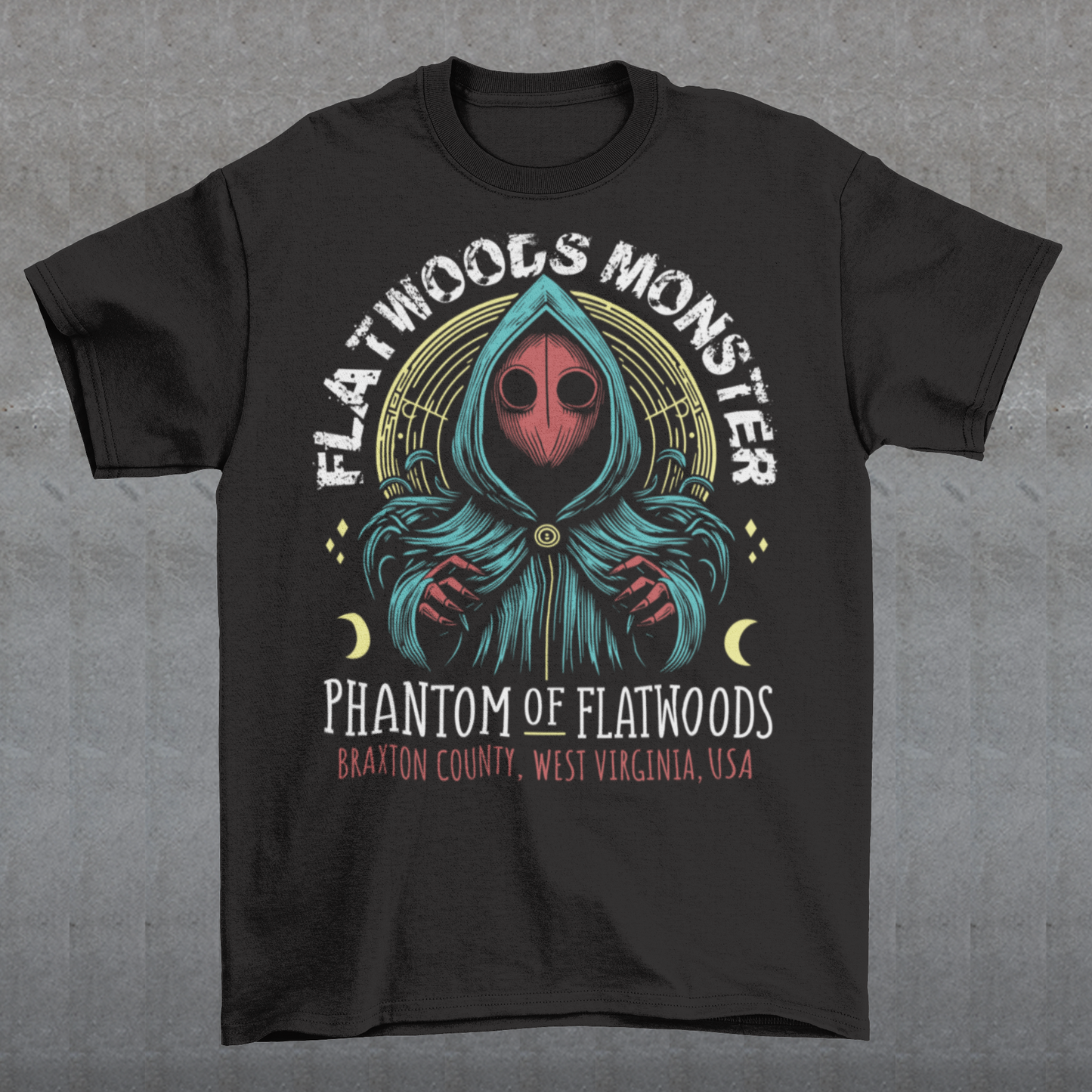 Introducing our Flatwoods Monster tee, where eerie meets style! Above the iconic image of the cryptid, bold white letters spell out "FLATWOODS MONSTER," while below, in a spooky font, "PHANTOM OF FLATWOODS" sets the mood. This t-shirt is perfect for enthusiasts of the paranormal, UFO aficionados, or anyone with an eye for the enigmatic. Flaunt your fascination with the unknown and spark conversations wherever you go.