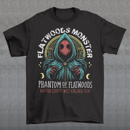 Introducing our Flatwoods Monster tee, where eerie meets style! Above the iconic image of the cryptid, bold white letters spell out "FLATWOODS MONSTER," while below, in a spooky font, "PHANTOM OF FLATWOODS" sets the mood. This t-shirt is perfect for enthusiasts of the paranormal, UFO aficionados, or anyone with an eye for the enigmatic. Flaunt your fascination with the unknown and spark conversations wherever you go.