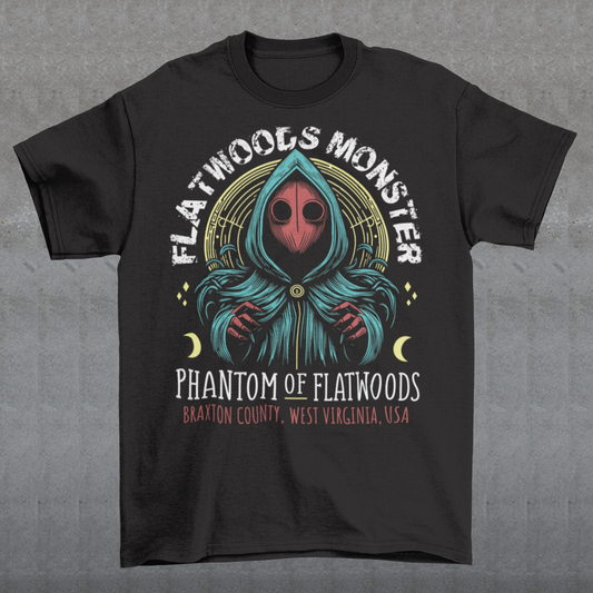 Introducing our Flatwoods Monster tee, where eerie meets style! Above the iconic image of the cryptid, bold white letters spell out "FLATWOODS MONSTER," while below, in a spooky font, "PHANTOM OF FLATWOODS" sets the mood. This t-shirt is perfect for enthusiasts of the paranormal, UFO aficionados, or anyone with an eye for the enigmatic. Flaunt your fascination with the unknown and spark conversations wherever you go.