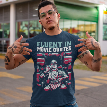 Introducing the "Fluent in Movie Quotes" T-Shirt, a must-have for all movie buffs and cinema enthusiasts! This unique and eye-catching design features a person wearing classic red and blue 3D glasses, fully immersed in a thrilling movie experience at the cinema. With a bucket of popcorn in hand, this individual is the epitome of a true film lover.