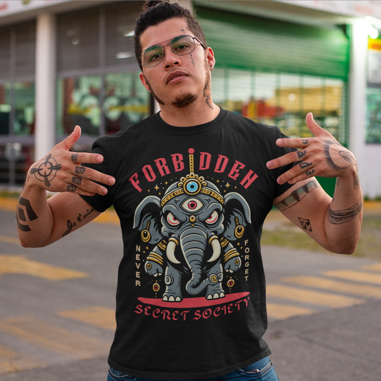 Black t-shirt of an Illuminati elephant with a third eye with text FORBIDDEN SECRET SOCIETY.