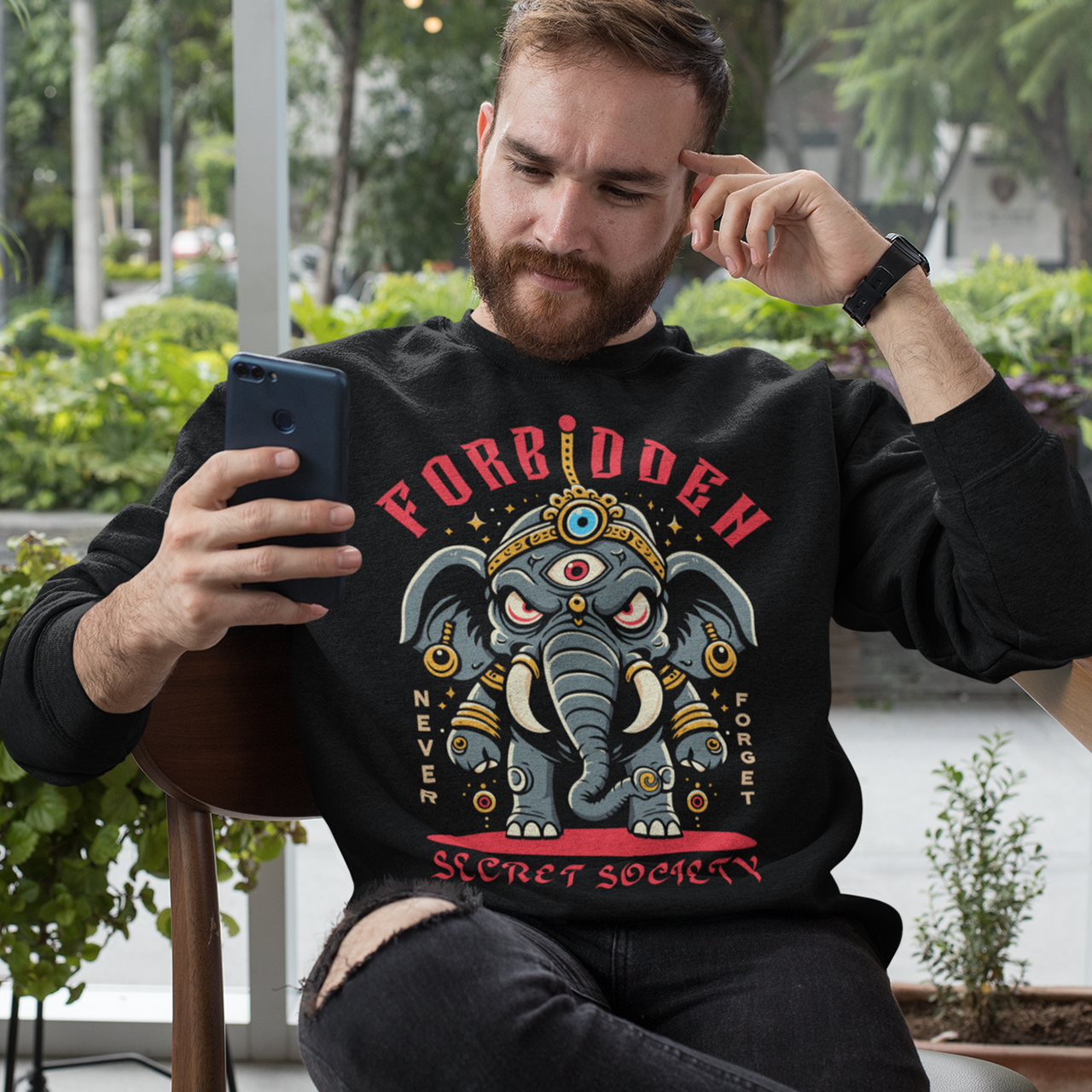 Black sweatshirt of an Illuminati elephant with a third eye with text FORBIDDEN SECRET SOCIETY.