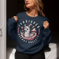 Navy sweatshirt of an Illuminati llama with a third eye with text FORBIDDEN SECRET SOCIETY.