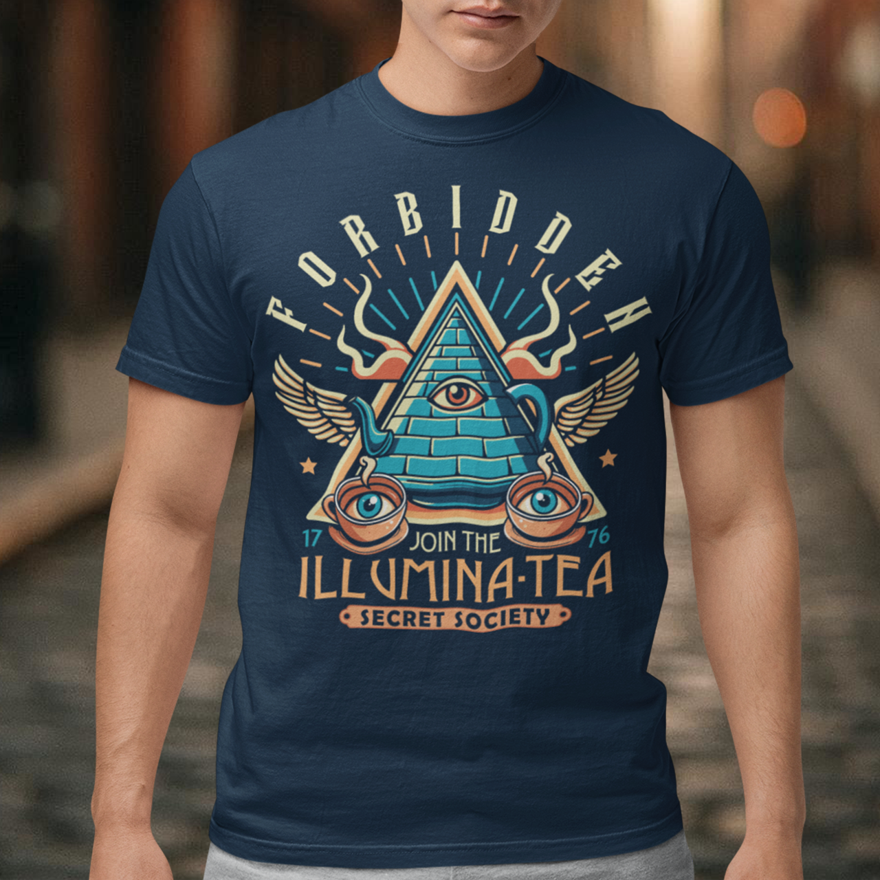 Step into the mysterious world of the Illuminati with this enigmatic t-shirt featuring a captivating design of a tea pot and cups, each adorned with iconic Illuminati symbols. Delve into the depths of secrecy as you sip your tea, knowing that you possess the knowledge of the ages. With its clever wordplay, the text "ILLUMINA-TEA" adds a playful twist, inviting intrigue and curiosity from those around you.