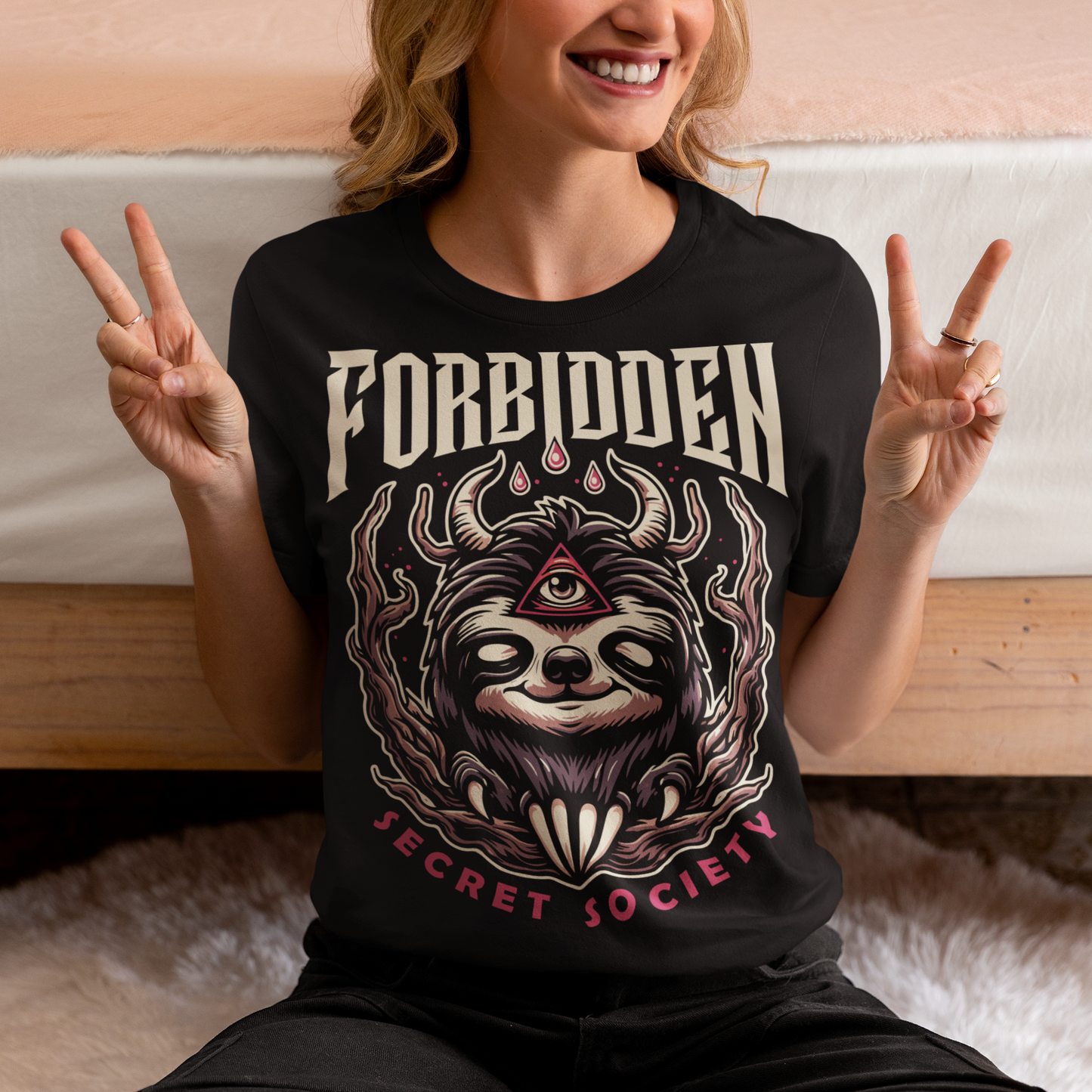 "Step into the enigmatic world of clandestine societies with our Forbidden Secret Society t-shirt featuring the elusive Illuminati sloth. This captivating design showcases a sloth adorned with symbolic imagery, including the all-seeing third eye, hinting at hidden knowledge and mystic insight. Embrace the intrigue and mystery as you don this unique tee, inviting curiosity and speculation wherever you go.