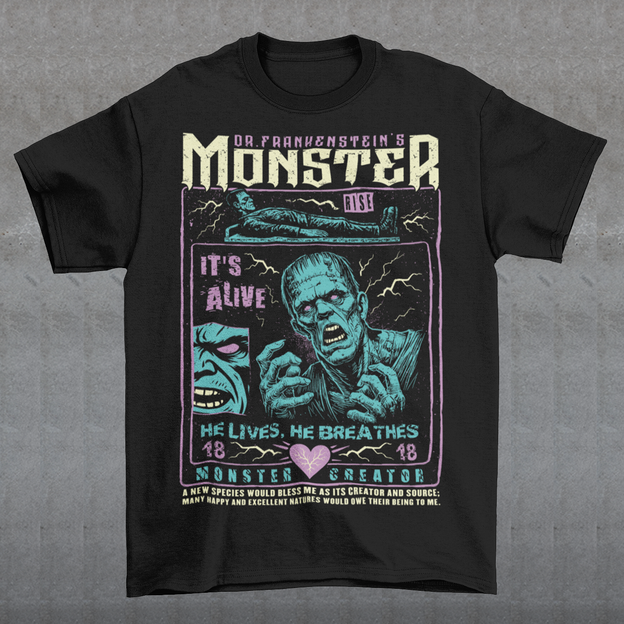 Black horror-themed t-shirt featuring a vintage Frankenstein monster graphic in distressed gray print. The design includes comic-style panels with lightning bolts, Dr. Frankenstein’s monster rising from a lab table, and bold text reading “It’s Alive.” Gothic typography and retro horror artwork give the shirt a classic monster movie aesthetic, perfect for Halloween, horror fans, gothic fashion lovers, and collectors of vintage spooky apparel.