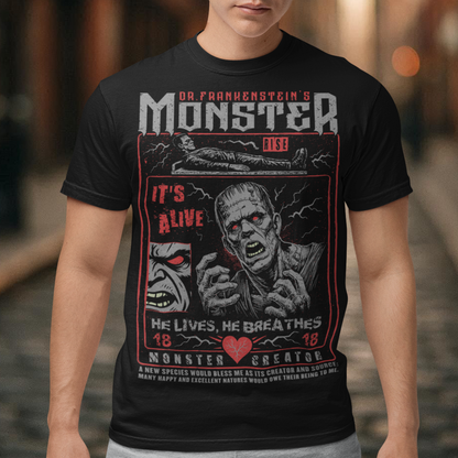 Black horror-themed t-shirt featuring a vintage Frankenstein monster graphic in distressed gray print. The design includes comic-style panels with lightning bolts, Dr. Frankenstein’s monster rising from a lab table, and bold text reading “It’s Alive.” Gothic typography and retro horror artwork give the shirt a classic monster movie aesthetic, perfect for Halloween, horror fans, gothic fashion lovers, and collectors of vintage spooky apparel.