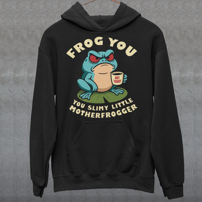 Frog You Motherfrogger hoodie - Angry Frog Shirt - Funny Animal Meme Top - Frog Lover Gift. Serve attitude with a side of caffeine in this bold and hilarious “Frog Off Motherfrogger” hoodie. Featuring a grumpy frog perched on a lily pad, clutching a “Not Today” coffee mug, this design perfectly captures those moods when patience is low and sarcasm is high. With its cheeky wordplay and expressive character, it’s the ultimate statement piece for anyone who appreciates humor with a bite.