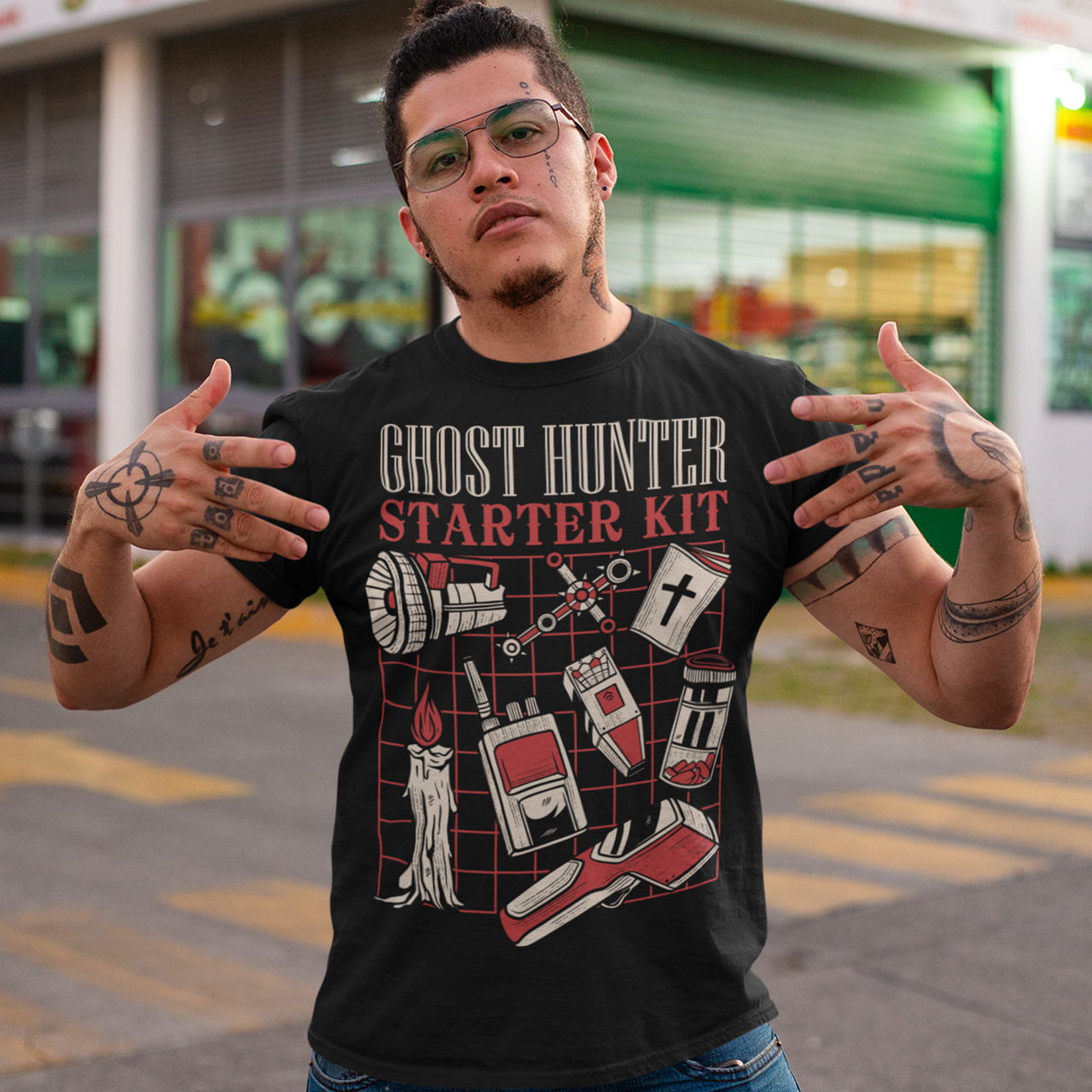 Step into the shadows with this Ghost Hunter Starter Kit t-shirt, a perfect blend of spooky humor and paranormal adventure. Designed for fans of ghost hunting, horror culture, and all things supernatural, this bold graphic tee features a vintage-style layout packed with classic ghost hunting essentials like an EMF reader, flashlight, candle, spirit box, holy book, and more.