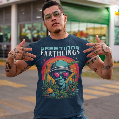 Embrace extraterrestrial style with our captivating t-shirt featuring a quirky alien extending intergalactic salutations with the message, "GREETINGS EARTHLINGS." This whimsical design showcases a friendly extraterrestrial being, adding an otherworldly charm to your wardrobe. The vibrant and detailed illustration captures the essence of cosmic curiosity, making it a perfect choice for those who appreciate a touch of the unknown.