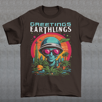 Embrace extraterrestrial style with our captivating t-shirt featuring a quirky alien extending intergalactic salutations with the message, "GREETINGS EARTHLINGS." This whimsical design showcases a friendly extraterrestrial being, adding an otherworldly charm to your wardrobe. The vibrant and detailed illustration captures the essence of cosmic curiosity, making it a perfect choice for those who appreciate a touch of the unknown.