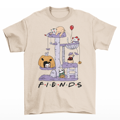 Cream halloween t-shirt of horror cat characters on a cat tree with text  "FIENDS".