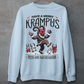 Light Blue sweatshirt of Krampus partying at Christmas and text "HAVE A MERRY KRAMPUS."