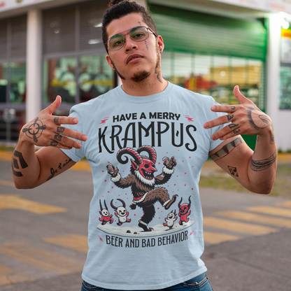The T-shirt design features Krampus in a festive yet mischievous scene, decked out in holiday cheer. Krampus, the legendary Christmas creature, is depicted dancing with a mischievous grin, holding a beer and surrounded by a few playful imps. Above the scene, bold black lettering reads, "HAVE A MERRY KRAMPUS," with a mix of gothic and playful fonts, giving it a fun yet eerie holiday vibe.