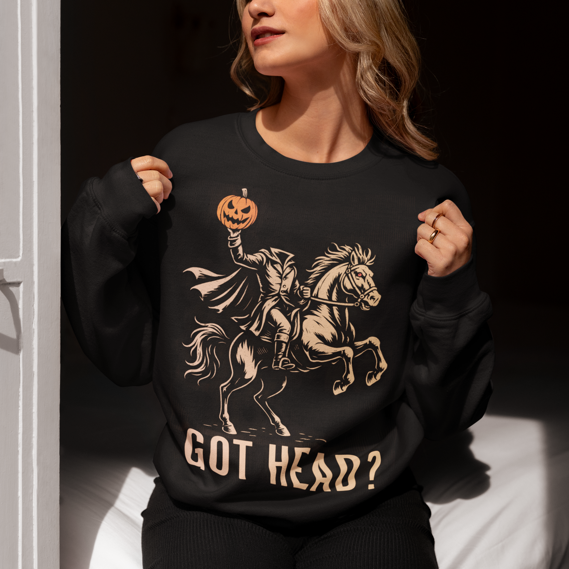Unleash your spooky side with our “Got Head?” Headless Horseman Sweatshirt — the perfect blend of dark humor and Halloween legend. Featuring a bold, detailed illustration of the iconic Headless Horseman, this shirt captures eerie motion and mischief in one unforgettable design. The clever “Got Head?” slogan adds a playful twist that’s sure to turn heads (pun intended).