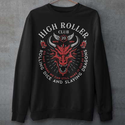 Step into legend status with the High Roller Club sweatshirt, forged for dice slingers, dragon slayers, and tabletop tacticians who play big and roll fearless. Featuring a fierce dragon crest and bold D20 iconography, this design salutes those who know fortune favors the bold and sometimes the wildly unprepared. Cozy enough for late night campaigns and intimidating enough for the gaming table, it’s built for crits, curses, and clutch saves alike. 