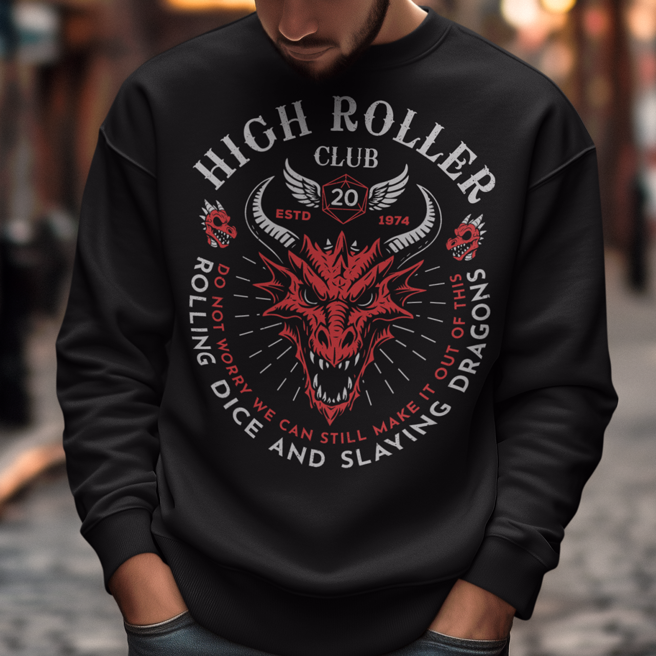Step into legend status with the High Roller Club sweatshirt, forged for dice slingers, dragon slayers, and tabletop tacticians who play big and roll fearless. Featuring a fierce dragon crest and bold D20 iconography, this design salutes those who know fortune favors the bold and sometimes the wildly unprepared. Cozy enough for late night campaigns and intimidating enough for the gaming table, it’s built for crits, curses, and clutch saves alike. 