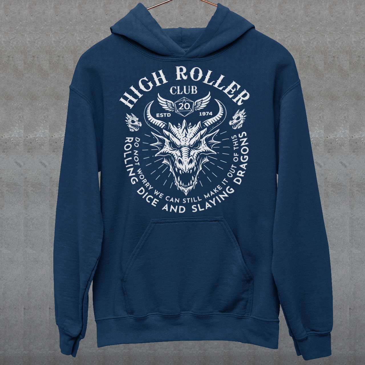 Step into legend status with the High Roller Club hoodie, forged for dice slingers, dragon slayers, and tabletop tacticians who play big and roll fearless. Featuring a fierce dragon crest and bold D20 iconography, this design salutes those who know fortune favors the bold and sometimes the wildly unprepared. Cozy enough for late night campaigns and intimidating enough for the gaming table, it’s built for crits, curses, and clutch saves alike.