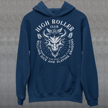 Step into legend status with the High Roller Club hoodie, forged for dice slingers, dragon slayers, and tabletop tacticians who play big and roll fearless. Featuring a fierce dragon crest and bold D20 iconography, this design salutes those who know fortune favors the bold and sometimes the wildly unprepared. Cozy enough for late night campaigns and intimidating enough for the gaming table, it’s built for crits, curses, and clutch saves alike.
