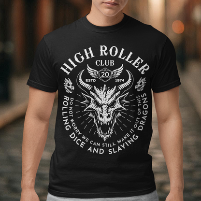 Step into legend status with the High Roller Club t-shirt, forged for dice slingers, dragon slayers, and tabletop tacticians who play big and roll fearless. Featuring a fierce dragon crest and bold D20 iconography, this design salutes those who know fortune favors the bold and sometimes the wildly unprepared. Cozy enough for late night campaigns and intimidating enough for the gaming table, it’s built for crits, curses, and clutch saves alike.