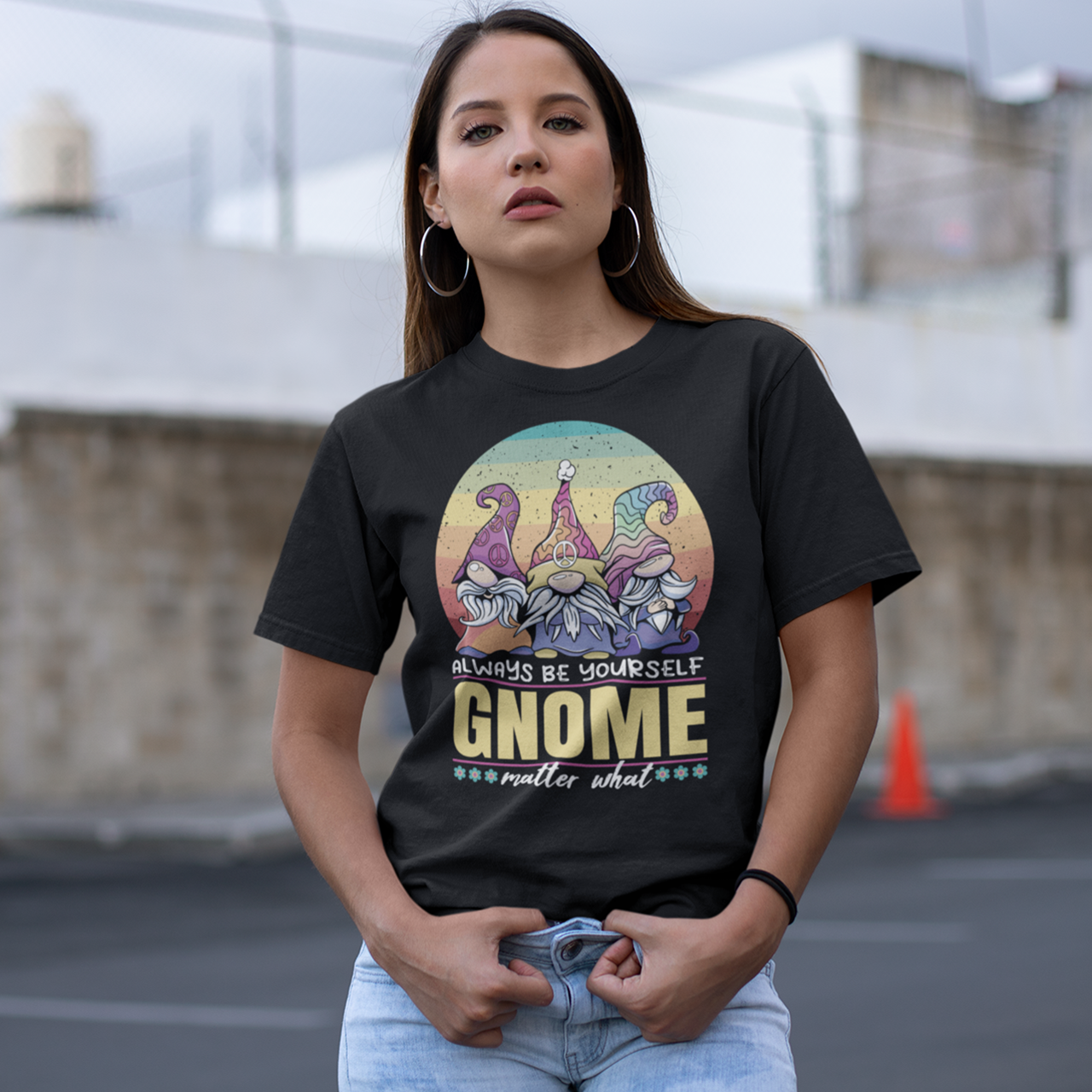 Black t-shirt of 3 hippie gnomes with a retro rainbow sun background with text underneath "ALWAYS BE YOURSELF GNOME MATTER WHAT".