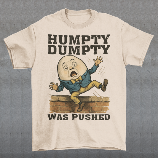 Make a bold statement with our "Humpty Dumpty Was Pushed" T-shirt — a clever twist on the classic nursery rhyme. Featuring a playful yet rebellious design of Humpty Dumpty mid-fall from his iconic wall, this shirt mixes dark humor with nostalgic charm. Perfect for anyone who loves witty graphics, conspiracy-style humor, or just wants to spark a few laughs and double-takes.