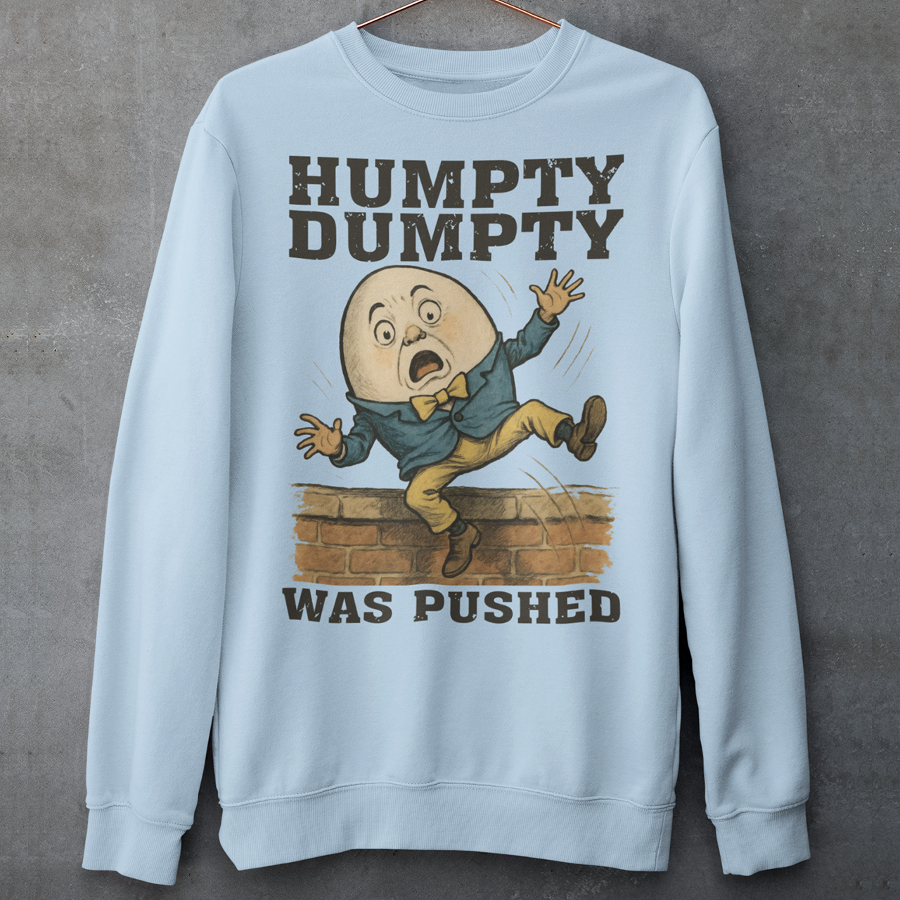 Make a bold statement with our "Humpty Dumpty Was Pushed" Sweatshirt — a clever twist on the classic nursery rhyme. Featuring a playful yet rebellious design of Humpty Dumpty mid-fall from his iconic wall, this shirt mixes dark humor with nostalgic charm. Perfect for anyone who loves witty graphics, conspiracy-style humor, or just wants to spark a few laughs and double-takes.