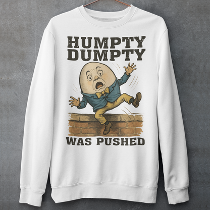 Make a bold statement with our "Humpty Dumpty Was Pushed" Sweatshirt — a clever twist on the classic nursery rhyme. Featuring a playful yet rebellious design of Humpty Dumpty mid-fall from his iconic wall, this shirt mixes dark humor with nostalgic charm. Perfect for anyone who loves witty graphics, conspiracy-style humor, or just wants to spark a few laughs and double-takes.