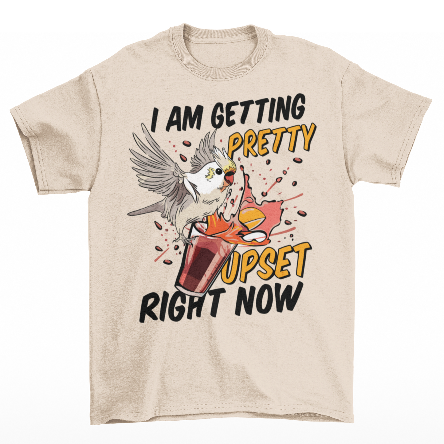 Cream t-shirt of cockatoo knocking over a cocktail with text underneath "I AM GETTING PRETTY UPSET RIGHT NOW".