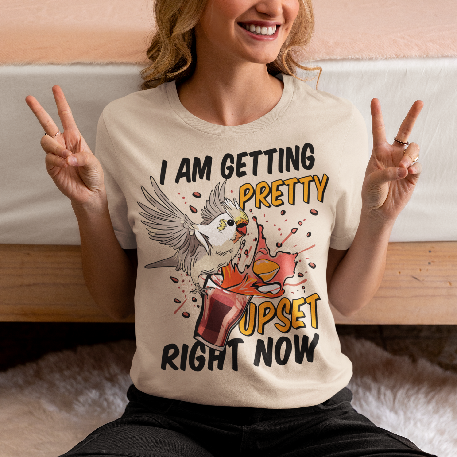 Introducing our whimsical and vibrant t-shirt featuring a mischievous cockatoo caught in a comical escapade. This design captures the playful spirit of this feathered troublemaker as it gleefully knocks over a meticulously crafted cocktail, sending colorful liquids splashing in all directions. The image perfectly portrays the unpredictable and endearing nature of these intelligent birds.