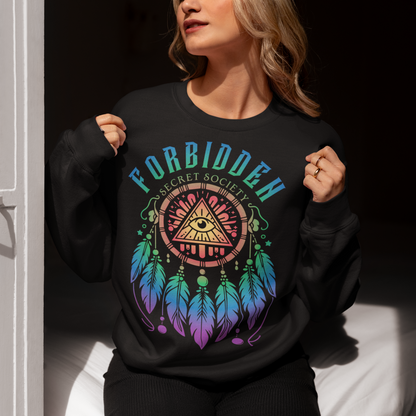 "Step into the enigmatic world of clandestine knowledge with our Illuminati Dreamcatcher sweatshirt. Featuring an intricate design that merges the mystique of the Illuminati symbol with the cultural heritage of dreamcatchers, this tee is a fusion of intrigue and symbolism. The central eye, a hallmark of Illuminati iconography, peers out from the heart of the dreamcatcher, symbolizing the pursuit of hidden truths and enlightenment.
