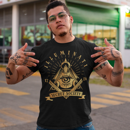 Step into the enigmatic world of secret societies with this captivating and thought-provoking t-shirt. Featuring the iconic Free Mason symbol, this garment is a bold statement piece that invites intrigue and curiosity. At the heart of this design lies the timeless and mysterious emblem of the Free Masons, an ancient symbol that has captivated minds for centuries.