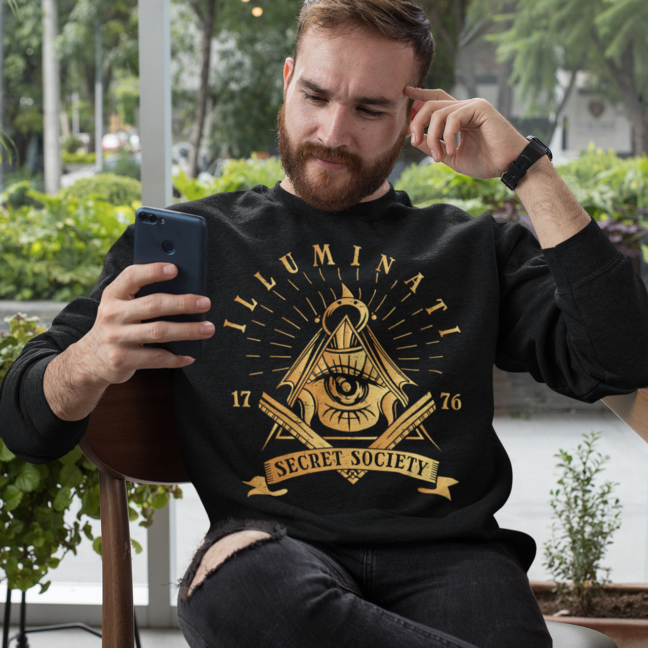 Black sweatshirt with a free mason symbol and text Illuminati Secret Society.