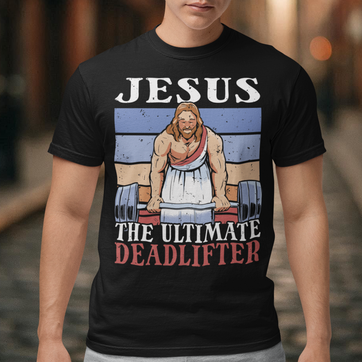 Introducing our bold and inspiring t-shirt design: "Jesus, The Ultimate Deadlifter." This unique and empowering graphic captures the strength, determination, and unwavering spirit of Jesus Christ as he takes on the challenge of deadlifting. The center of attention is an awe-inspiring depiction of Jesus Christ, muscles flexed and veins pulsating, showcasing his extraordinary strength. With a focus on his remarkable physicality, this design showcases Jesus in a moment of triumph.