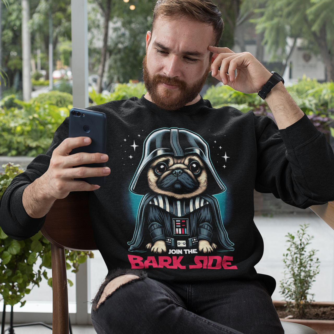 Black sweatshirt of a pug dressed as a sith with text underneath "JOIN THE BARK SIDE".