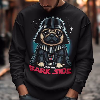 Introducing the ultimate "Join the Bark Side" Sweatshirt. This playful design features an adorable pug dressed as a Sith Lord and a determined, yet undeniably cute, expression. The pug's wrinkled face and intense stare will make anyone smile, as he embodies the dark side in the most charming way possible. Beneath the pug, bold text reads "JOIN THE BARK SIDE," adding a humorous twist to the classic phrase. This shirt is sure to be a hit for those with a love for pups and galactic adventures!