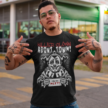 Black t-shirt with a killer clown holding a sign which reads YOU'RE NEXT with text above" KILLER CLOWN ABOUT TOWN".