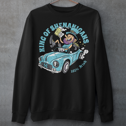 Black sweatshirt with a leprechaun driving a car with text KING OF SHENANIGANS.