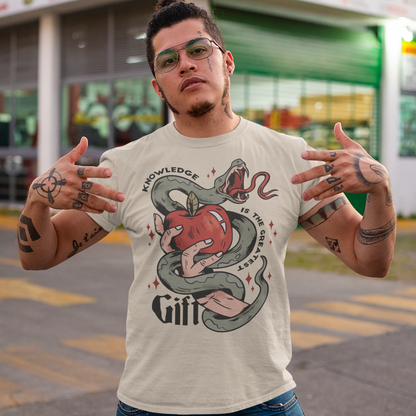 Introducing our captivating "Knowledge is the Greatest Gift" T-shirt – a design that seamlessly blends symbolism and style. Centered on the tee is a powerful image: a meticulously drawn hand cradling a luscious apple, artfully encased in the sinuous coils of a serpent. This iconic representation pays homage to the age-old biblical tale of Adam and Eve, where the apple, symbolizing knowledge, is intertwined with the cunning serpent.