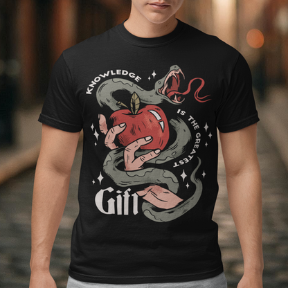 Introducing our captivating "Knowledge is the Greatest Gift" T-shirt – a design that seamlessly blends symbolism and style. Centered on the tee is a powerful image: a meticulously drawn hand cradling a luscious apple, artfully encased in the sinuous coils of a serpent. This iconic representation pays homage to the age-old biblical tale of Adam and Eve, where the apple, symbolizing knowledge, is intertwined with the cunning serpent.