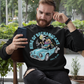 Black sweatshirt with a leprechaun driving a car with text KING OF SHENANIGANS.