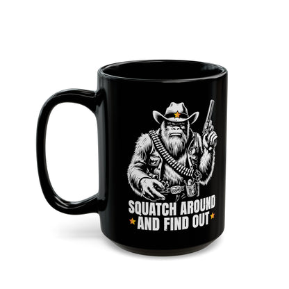 Black mug of a sheriff Sasquatch in the wild west holding a gun with text underneath SQUATCH AROUND AND FIND OUT.