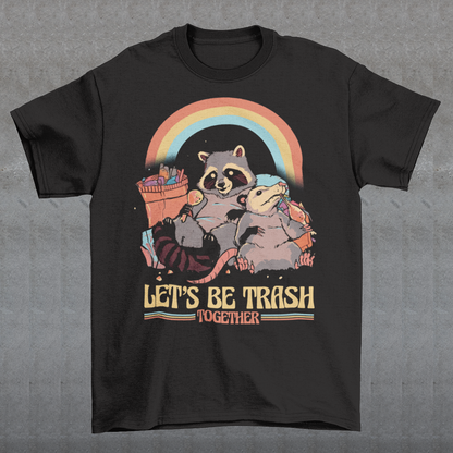 Get ready to embrace your mischievous side with this adorable raccoon and possum duo on a quest for fun! The vibrant graphic features a playful raccoon and a curious possum side by side, ready to conquer the night. Beneath this charismatic pair, bold text reads "LET'S BE TRASH TOGETHER," capturing the essence of camaraderie in their shared adventures.