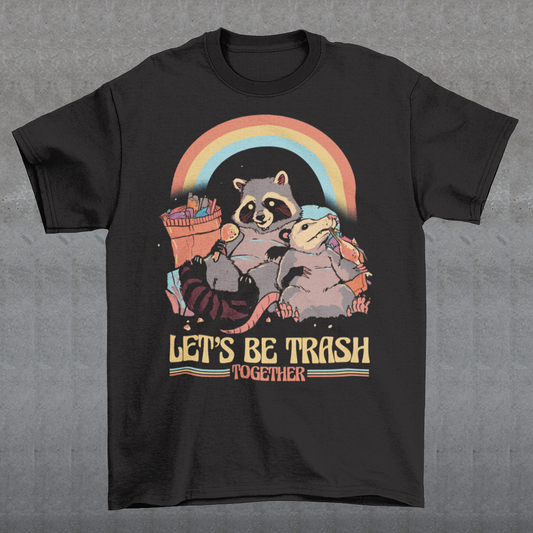 Get ready to embrace your mischievous side with this adorable raccoon and possum duo on a quest for fun! The vibrant graphic features a playful raccoon and a curious possum side by side, ready to conquer the night. Beneath this charismatic pair, bold text reads "LET'S BE TRASH TOGETHER," capturing the essence of camaraderie in their shared adventures.