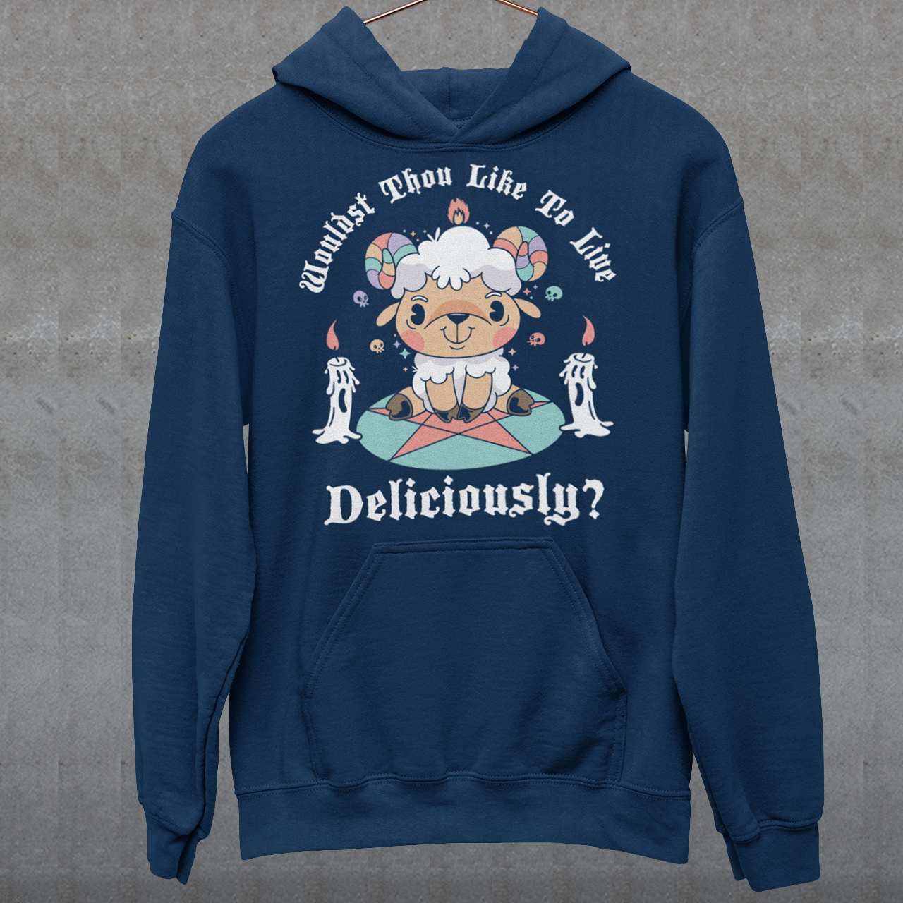 Unleash your inner rebel with this striking graphic hoodie featuring a smug, mystical goat perched atop a pentagram—summoning vibes as bold as your wardrobe. Inspired by folklore and a hint of witchy sarcasm, the chilling phrase "WOULDST THOU LIKE TO LIVE DELICIOUSLY?" is scrawled across the design in eerie, arcane lettering. Perfect for fans of the occult, dark humor, and aesthetic rebellion.
